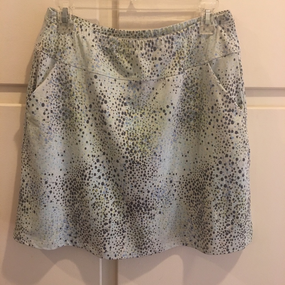 skort, and Calvin Klein shirt. Both are medium